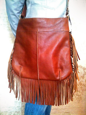 A warm brown bag with fringes